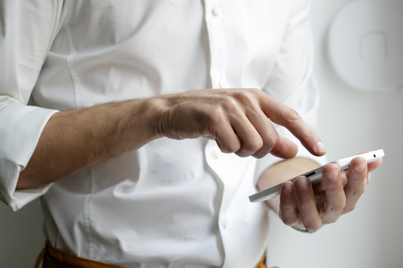 Member using the mobile banking app on a smartphone